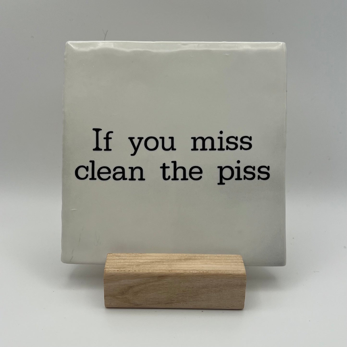 Tegeltje - If you miss clean the piss